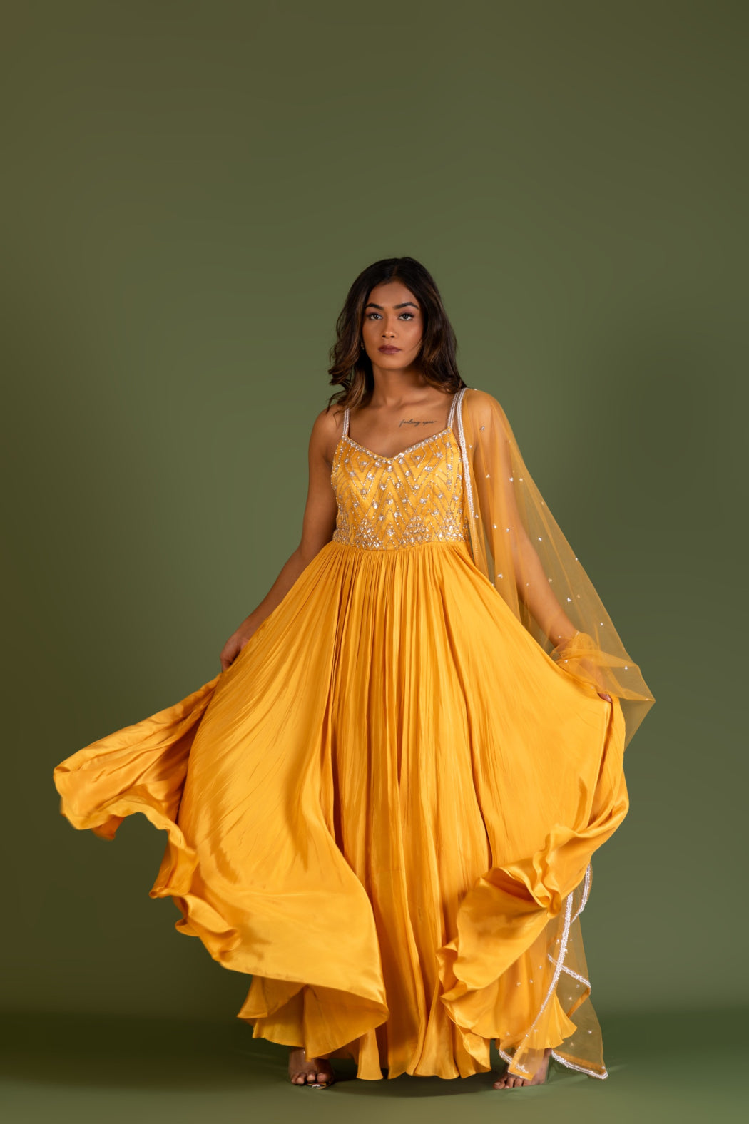 MUSTARD YELLOW PLEATED GOWN