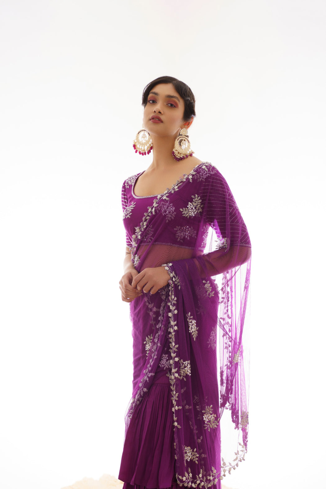 PURPLE RUFFELED SAREE WITH HEAVY EMBROIDERED ATTACHED PALLU