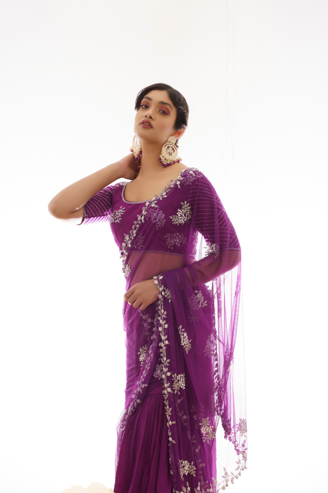 PURPLE RUFFELED SAREE WITH HEAVY EMBROIDERED ATTACHED PALLU